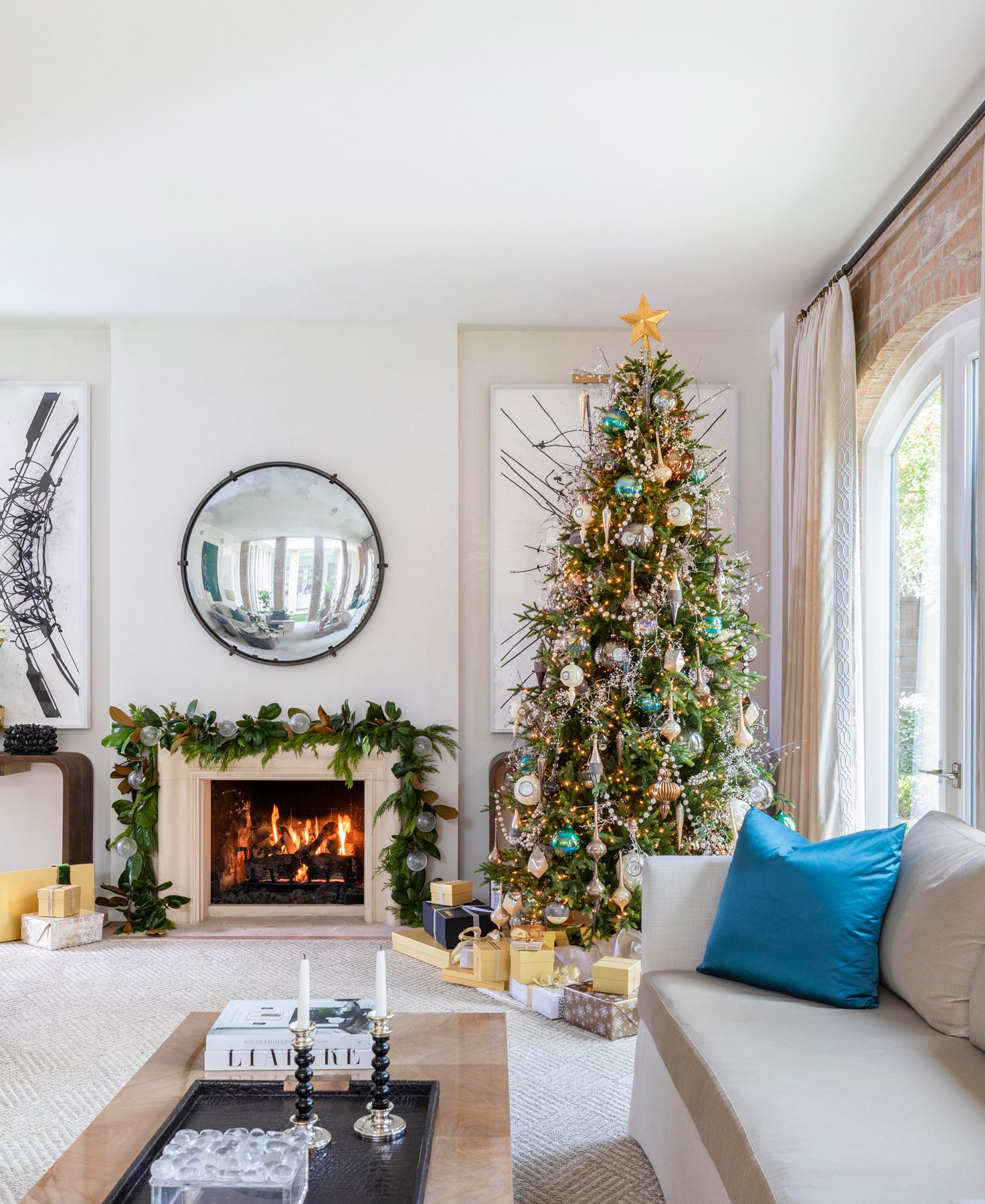 Professionally decorated Christmas tree in a residential home.