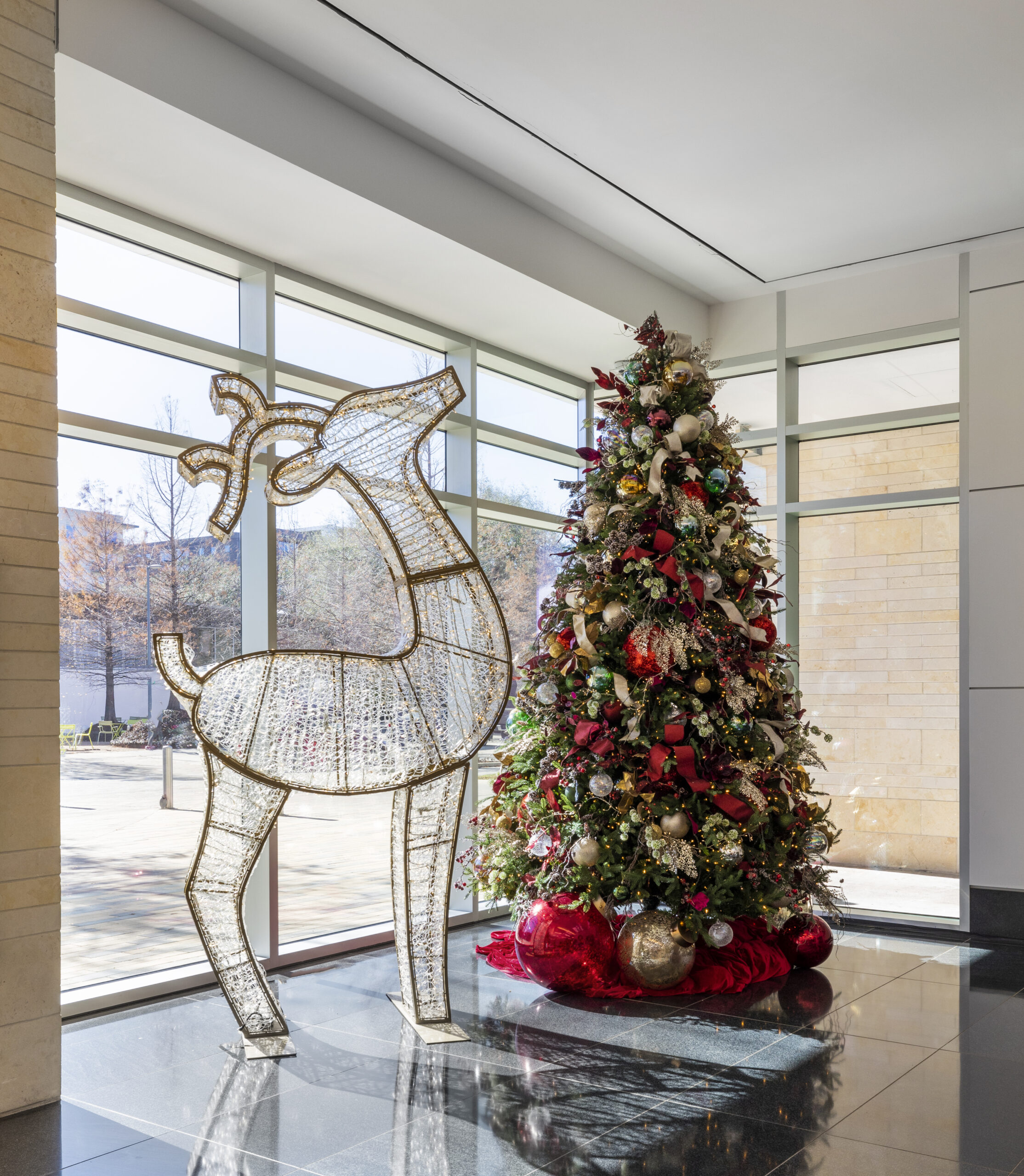 Professionally decorated Christmas Tree and Reindeer in Corporate Lobby